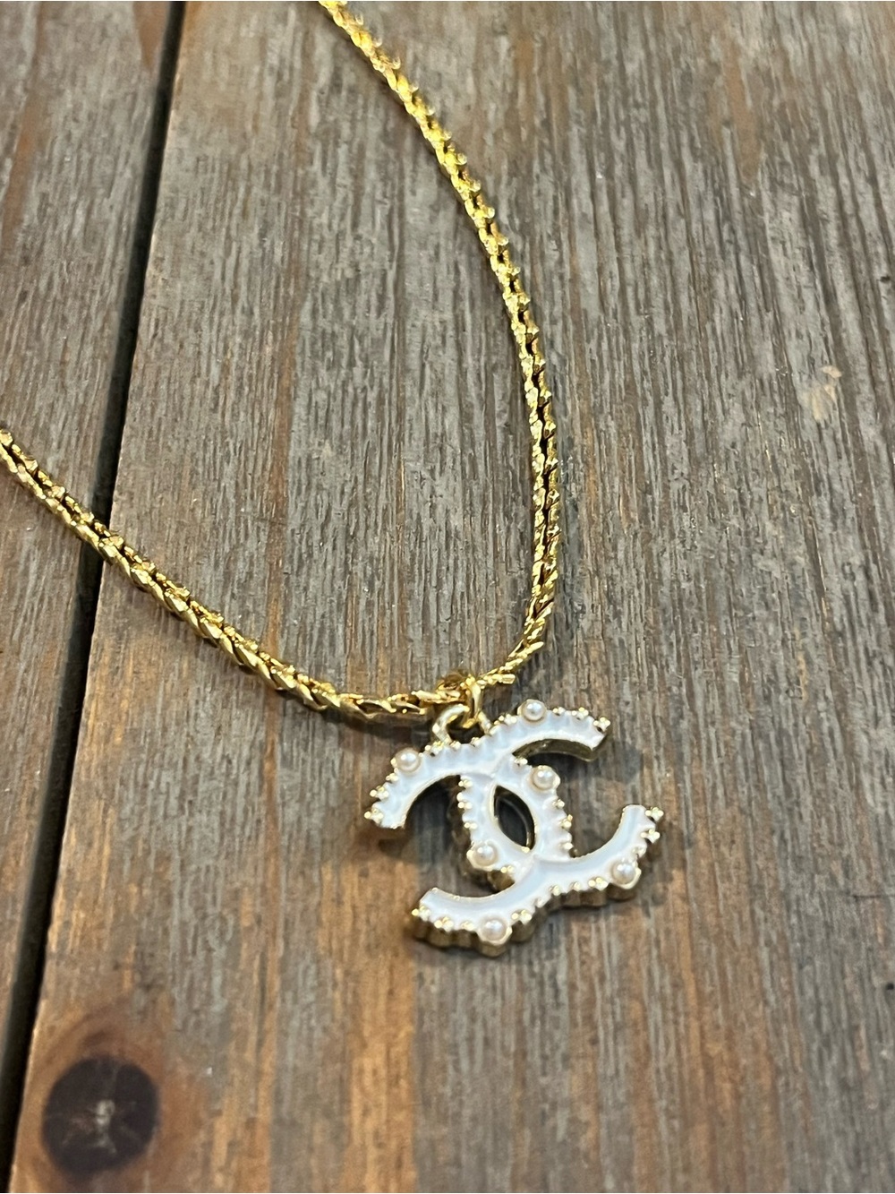 Gold-Tone Necklace with White Pearl-Embellished CC Pendant